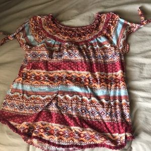 Red orange patterned shirt